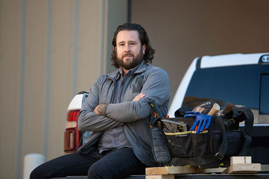 Man sitting on truck